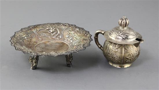 An early 20th century Chinese repousse silver bonbon dish by Woshing, Shanghai & a cream jug.
